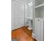 Bathroom featuring a pedestal sink and closet at 441 Crumbley Rd, Mcdonough, GA 30252