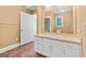 Bathroom features a large mirror above the vanity, and decorative gold hardware at 441 Crumbley Rd, Mcdonough, GA 30252