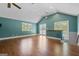 Bonus room featuring high ceilings, hardwood floors, a window and french doors leading to deck at 441 Crumbley Rd, Mcdonough, GA 30252