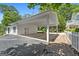 Spacious detached carport featuring a covered area and exterior building at 441 Crumbley Rd, Mcdonough, GA 30252