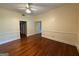 Living room with hardwood flooring, cream walls, and white trim provides a cozy atmosphere at 441 Crumbley Rd, Mcdonough, GA 30252