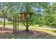 Close-up shot of a treehouse and ladder; the perfect backyard retreat for endless fun and adventure at 441 Crumbley Rd, Mcdonough, GA 30252