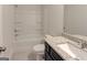 Bathroom featuring a bathtub, shower, and vanity with a sink and granite countertop at 3292 Mill Forest Sw Dr, Conyers, GA 30094