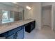 Bathroom with granite countertops, dual sinks, and vanity featuring a shower and soaking tub at 3292 Mill Forest Sw Dr, Conyers, GA 30094