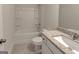 Clean bathroom featuring tub with shower, granite vanity, and modern fixtures at 3292 Mill Forest Sw Dr, Conyers, GA 30094
