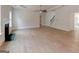Spacious living area features wood floors, fireplace, and seamless transition to other areas of the home at 3292 Mill Forest Sw Dr, Conyers, GA 30094