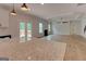 Inviting open-concept living area with wood floors, fireplace, and access to the outdoor deck at 3292 Mill Forest Sw Dr, Conyers, GA 30094