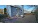 Large backyard with patio, bench seating, and partial fencing at 1230 Chris Lake Dr, Lawrenceville, GA 30046