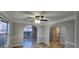 Dining room featuring arched doorways and tiled floors, seamlessly connecting living spaces at 1230 Chris Lake Dr, Lawrenceville, GA 30046