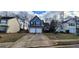 Charming two-story home features a two-car garage, lovely landscaping, and welcoming curb appeal at 1230 Chris Lake Dr, Lawrenceville, GA 30046
