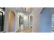 Inviting foyer with tile flooring, arched doorways, and staircase to the upper level at 1230 Chris Lake Dr, Lawrenceville, GA 30046