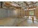 Unfinished basement space with framed walls, ductwork, and a window, ready to be customized at 155 Grace Hope Dr, Brooks, GA 30205