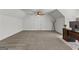 This large bedroom has carpeted floors, a ceiling fan, and a built-in desk for an office space at 155 Grace Hope Dr, Brooks, GA 30205