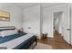 Comfortable bedroom featuring hardwood floors, and ample closet space at 155 Grace Hope Dr, Brooks, GA 30205