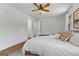 Bedroom featuring hard wood floors, neutral walls, ceiling fan, and lots of natural light at 155 Grace Hope Dr, Brooks, GA 30205