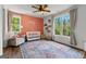 Bright Bedroom featuring a crib, area rug, windows and a chair, perfect for a growing Gathering at 155 Grace Hope Dr, Brooks, GA 30205
