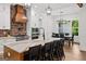 Bright kitchen with a large island, quartz countertops, stainless steel appliances, and eat in kitchen at 155 Grace Hope Dr, Brooks, GA 30205