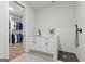 Laundry room with sink and walk-in closet access at 155 Grace Hope Dr, Brooks, GA 30205