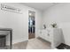Bright laundry room featuring a sink and access to a walk-in closet at 155 Grace Hope Dr, Brooks, GA 30205