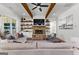 Living room featuring shiplap, wood shelves, stone fireplace and recessed lighting at 155 Grace Hope Dr, Brooks, GA 30205