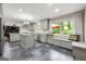 Bright kitchen with ample counter space, a center island, built-in storage, and stainless appliances at 1533 High Haven Ne Ct, Atlanta, GA 30329