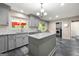 Updated kitchen featuring gray cabinets, granite countertops, and stainless steel appliances at 1533 High Haven Ne Ct, Atlanta, GA 30329