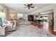 Open-concept living room connecting to a dining area with an outdoor view, perfect for entertaining at 1533 High Haven Ne Ct, Atlanta, GA 30329