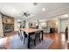 Open layout featuring living room, dining area, and fireplace offering a seamless entertaining space at 1533 High Haven Ne Ct, Atlanta, GA 30329