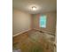 This bedroom has a window at 261 Sally Duke Dr, Whitesburg, GA 30185