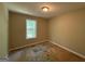This bedroom has a window offering natural light at 261 Sally Duke Dr, Whitesburg, GA 30185
