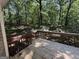 Expansive deck with wooden railings overlooks a lush, green backyard, perfect for outdoor entertaining at 261 Sally Duke Dr, Whitesburg, GA 30185