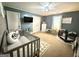 This Bedroom features a crib, neutral walls, and natural light from the window, creating a peaceful environment at 8340 Nolandwood Ln, Villa Rica, GA 30180