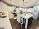 Well-lit modern kitchen featuring a large island and stainless steel appliances at 8340 Nolandwood Ln, Villa Rica, GA 30180