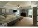 This main bedroom offers generous space, neutral walls, and modern lighting, providing a luxurious retreat at 8340 Nolandwood Ln, Villa Rica, GA 30180