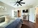 Cozy main bedroom with a comfortable bed, decorative furnishings, and ample natural light at 8340 Nolandwood Ln, Villa Rica, GA 30180