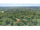 Aerial view of property with lush greenery and red location pin at 160 Country Mill Ln, Stockbridge, GA 30281