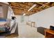Spacious unfinished basement with exposed ceiling, offering versatile potential at 160 Country Mill Ln, Stockbridge, GA 30281
