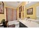 Bathroom featuring a single vanity sink, framed art, and patterned shower curtain at 160 Country Mill Ln, Stockbridge, GA 30281