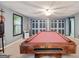 Inviting game room with a classic pool table and soft lighting to entertain guests at 160 Country Mill Ln, Stockbridge, GA 30281