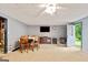 Comfortable living area with a wood-burning stove and access to the backyard at 160 Country Mill Ln, Stockbridge, GA 30281