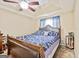 Relaxing main bedroom with tray ceiling and ceiling fan at 160 Country Mill Ln, Stockbridge, GA 30281