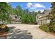 Spacious home includes a long driveway and a four car garage at 193 Stonegate Trl, Carrollton, GA 30116