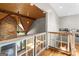 Foyer with a vaulted wooden ceiling and wooden railing at 193 Stonegate Trl, Carrollton, GA 30116