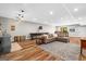 Finished basement with game room that features a shuffleboard table and kitchenette at 193 Stonegate Trl, Carrollton, GA 30116