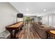 Finished basement with game room with kitchenette, shuffleboard table, and seating at 193 Stonegate Trl, Carrollton, GA 30116