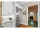 Modern kitchen with stainless steel appliances and white cabinetry at 193 Stonegate Trl, Carrollton, GA 30116