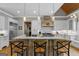 Bright, spacious kitchen with custom vent hood and center island at 193 Stonegate Trl, Carrollton, GA 30116