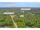 Aerial view of Covington, GA property showing home near Jersey Walnut Grove Rd and Harris Rockmore Loop at 392 Hightower Ridge Rd, Covington, GA 30014