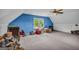 Spacious attic area providing ample storage and a bright window at 392 Hightower Ridge Rd, Covington, GA 30014