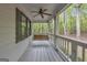 Inviting back porch with swing for relaxing and enjoying nature views at 392 Hightower Ridge Rd, Covington, GA 30014